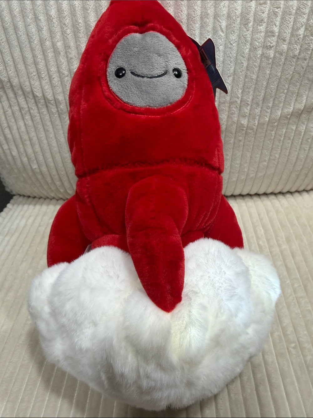 FAO Schwarz Glow Brights Space Rocket Plush. New. Makes rocket launching sound.